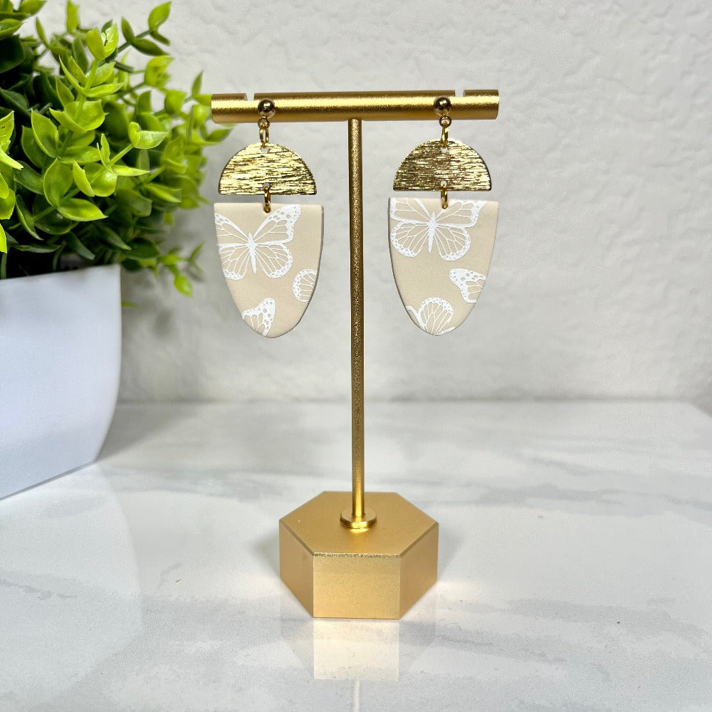 neutral butterfly brass